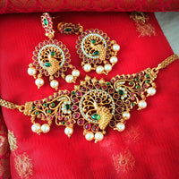 N03039_ classic matte gold polished temple jewelry choker style crafted design gold plated necklace set embellished with ruby and green stones .