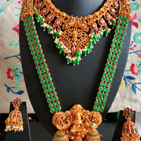 N03070_ Grand classic matte gold polished temple jewelry choker style and Long Haram crafted design gold plated necklace set embellished with ruby and green stones .