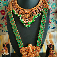 N03070_ Grand classic matte gold polished temple jewelry choker style and Long Haram crafted design gold plated necklace set embellished with ruby and green stones .
