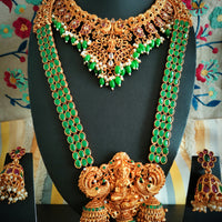 N03070_ Grand classic matte gold polished temple jewelry choker style and Long Haram crafted design gold plated necklace set embellished with ruby and green stones .