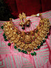 N03074_ Grand classic matte gold polished temple jewelry Long Haram & grand choker crafted design gold plated necklace set embellished with green stones .