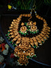 N03068_ Grand classic matte gold polished temple jewelry choker style and Long Haram crafted design gold plated necklace set embellished with ruby and green stones .