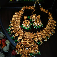 N03068_ Grand classic matte gold polished temple jewelry choker style and Long Haram crafted design gold plated necklace set embellished with ruby and green stones .