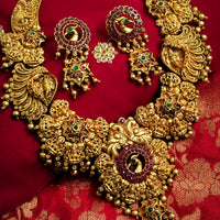 N03069_ Grand classic matte gold polished temple jewelry choker style and Long Haram crafted design gold plated necklace set embellished with ruby and green stones .