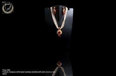 N010_Gorgeous white bead  Necklace studded with semi precious stones.