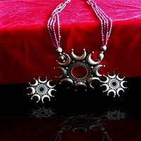 N063_Classy  Matte finish German Silver oxidized pendant followed by magenta crystals.