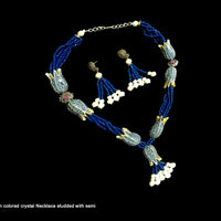 N011_Gorgeous blue colored crystal Necklace studded with semi precious stones.