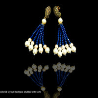 N011_Gorgeous blue colored crystal Necklace studded with semi precious stones.