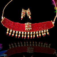 N071_Classy Style crimson red color Crystal Choker Necklace with delicate Kundan work embellished with pearls.
