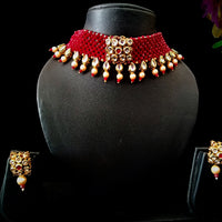 N071_Classy Style crimson red color Crystal Choker Necklace with delicate Kundan work embellished with pearls.