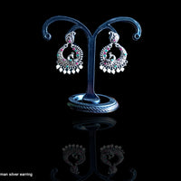 Silver oxidized earrings with exclusive silver peacock  work for a stunning and stylish look.