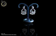 Silver oxidized earrings with exclusive silver peacock  work for a stunning and stylish look.
